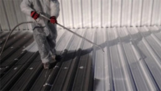 Man performing roof restoration