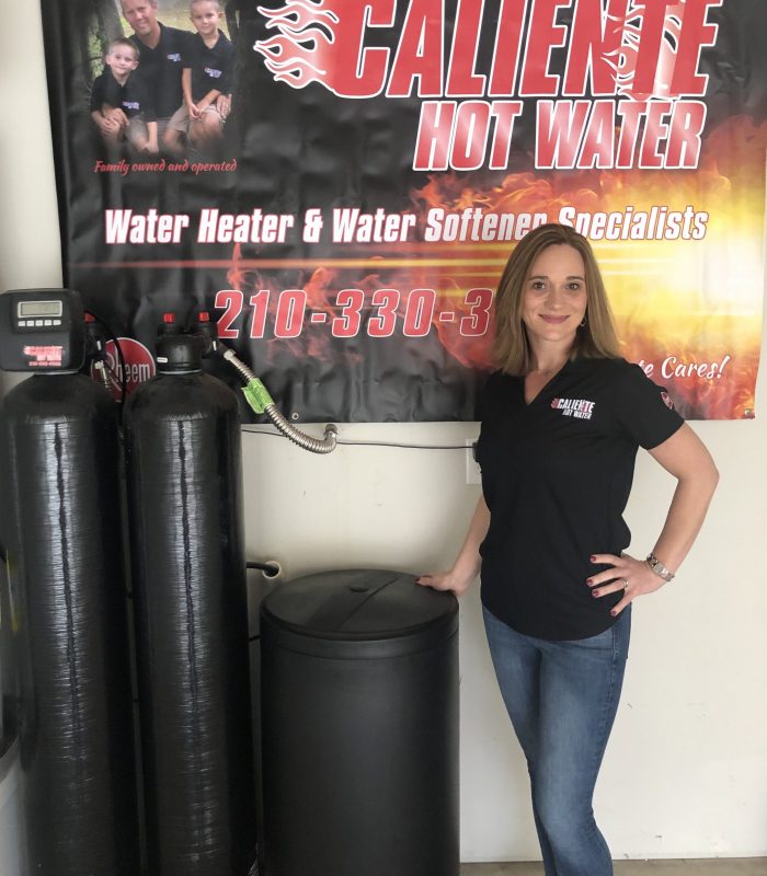 Caliente Hot Water – woman with banner Caliente Hot Water - woman with banner
